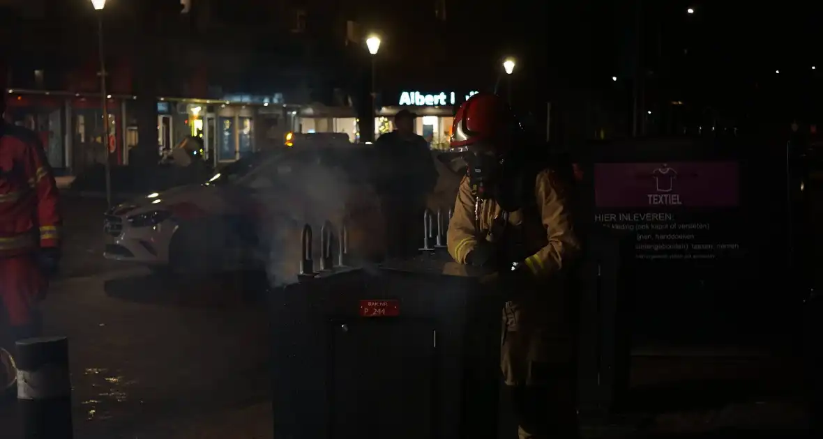 Vuur in ondergrondse container gedoofd - Foto 11