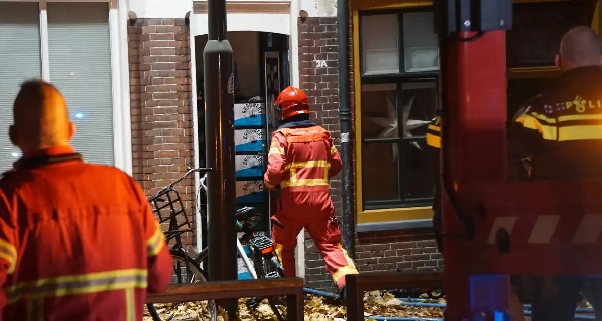 Woningbrand in studentenhuis geblust - Foto 10