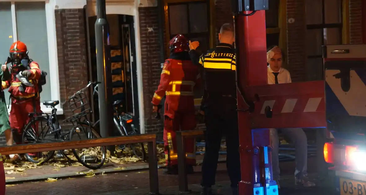 Woningbrand in studentenhuis geblust - Foto 11