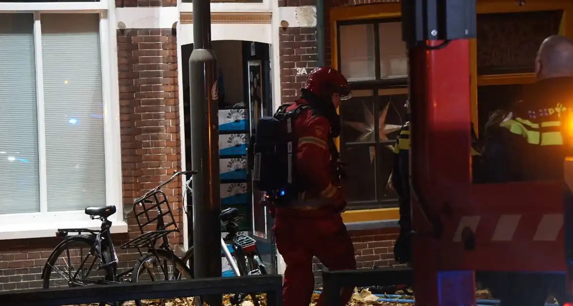 Woningbrand in studentenhuis geblust - Foto 12