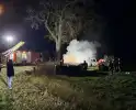 Hooibalen vangen vlam in buitenbrand