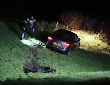 Bestuurder botst tegen dijk na poging tot aanrijding