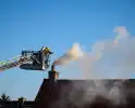 Brand in schoorsteen zorgt voor flinke rookontwikkeling