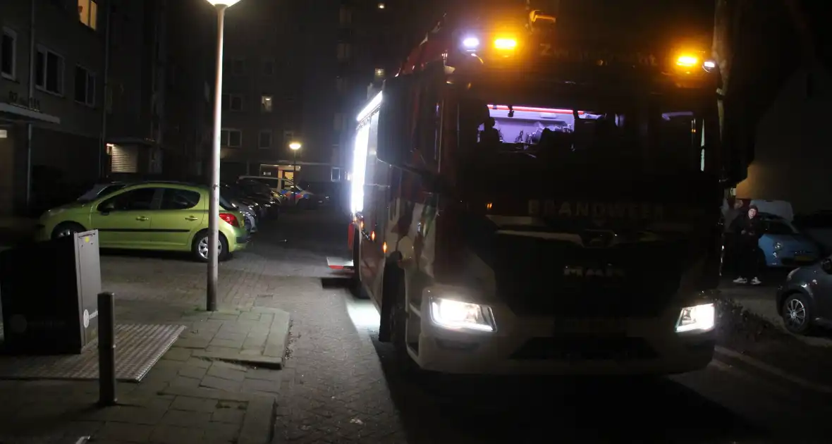 Brand in flatwoning leidt tot inzet brandweer - Foto 1