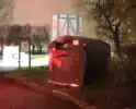 Kledingcontainer in brand door vuurwerk