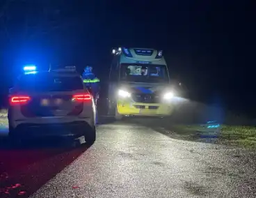 Twee personen te water in vroege ochtend