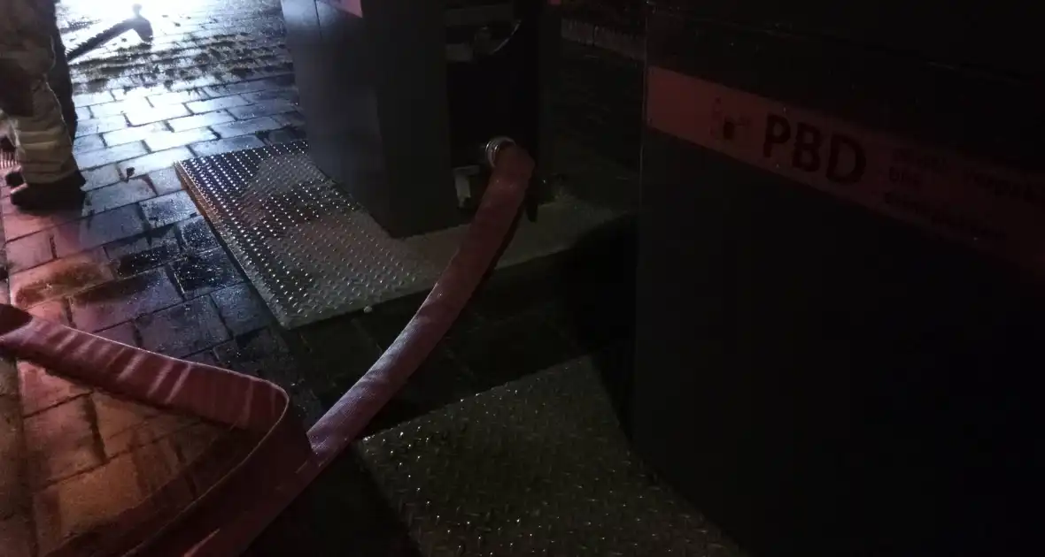Brand in ondergrondse container snel geblust door brandweer - Foto 1