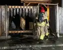 Brand verwoest schutting en vuilcontainers