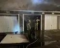 Brand in twee garageboxen