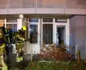 Ruit van deur geforceerd wegens brandmelding