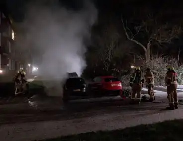 Straat vol rook door autobrand