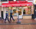 Politie onderzoekt explosie en brandstichting