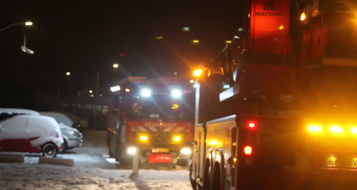 Vijfde etage ontruimd door brandlucht - Foto 1
