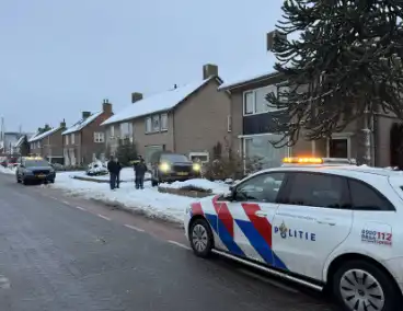 BMW crasht in voortuin na botsing