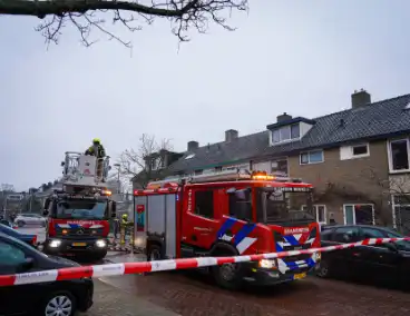 Rook uit zolder van woning