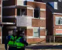 Dode en veel schade na woningbrand