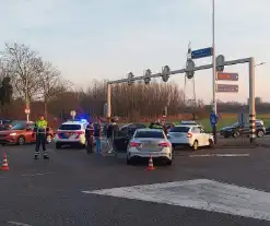 Taxi en personenauto in botsing op kruising