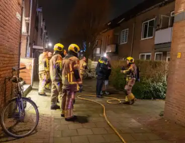 Brand in portiekwoning