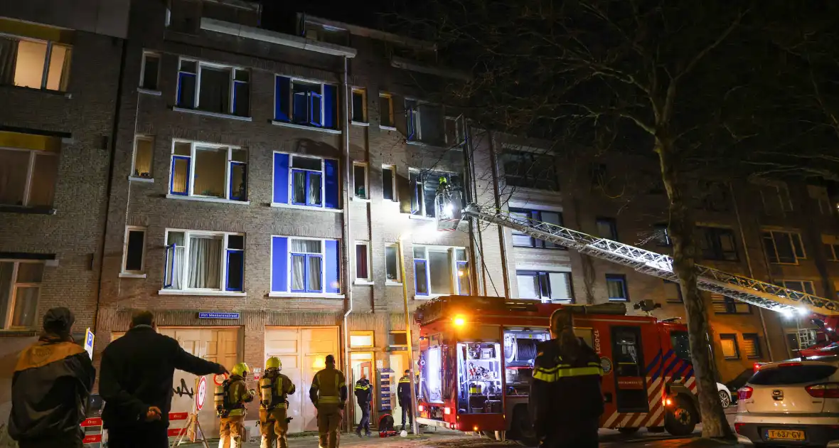 Brand in portiekwoning leidt tot evacuatie bewoners - Foto 8