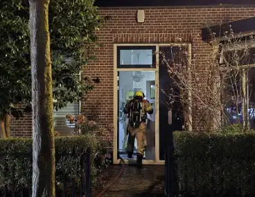 Rookontwikkeling bij nachtelijke woningbrand