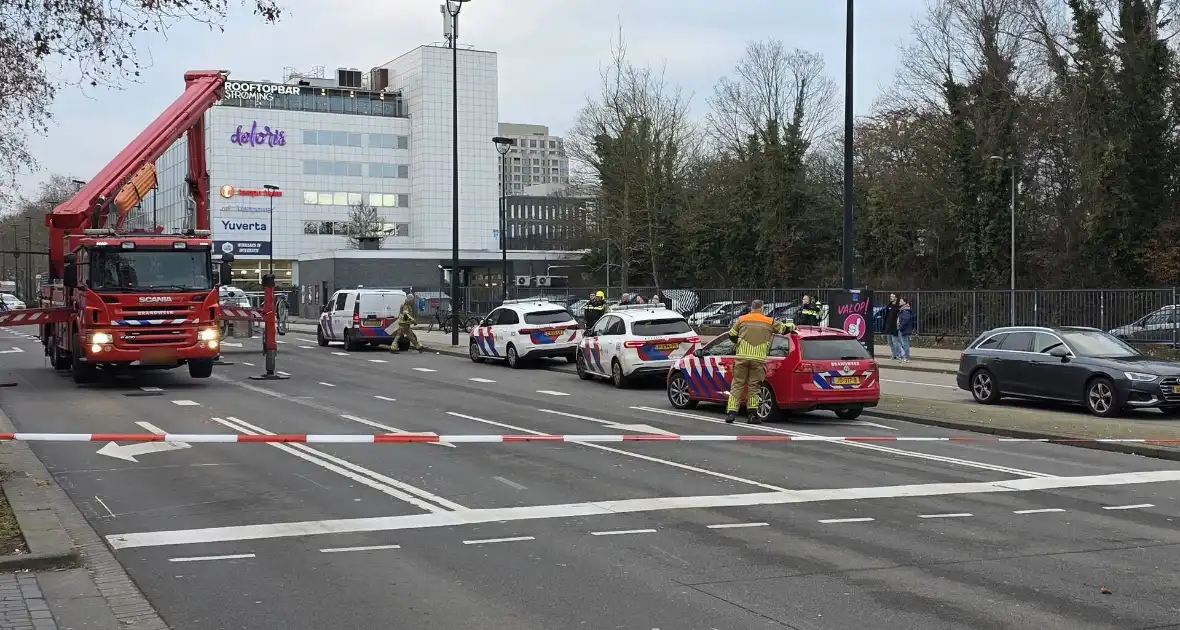 Politie houdt winkeldief aan op dak