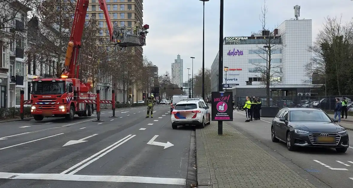 Politie houdt winkeldief aan op dak - Foto 2