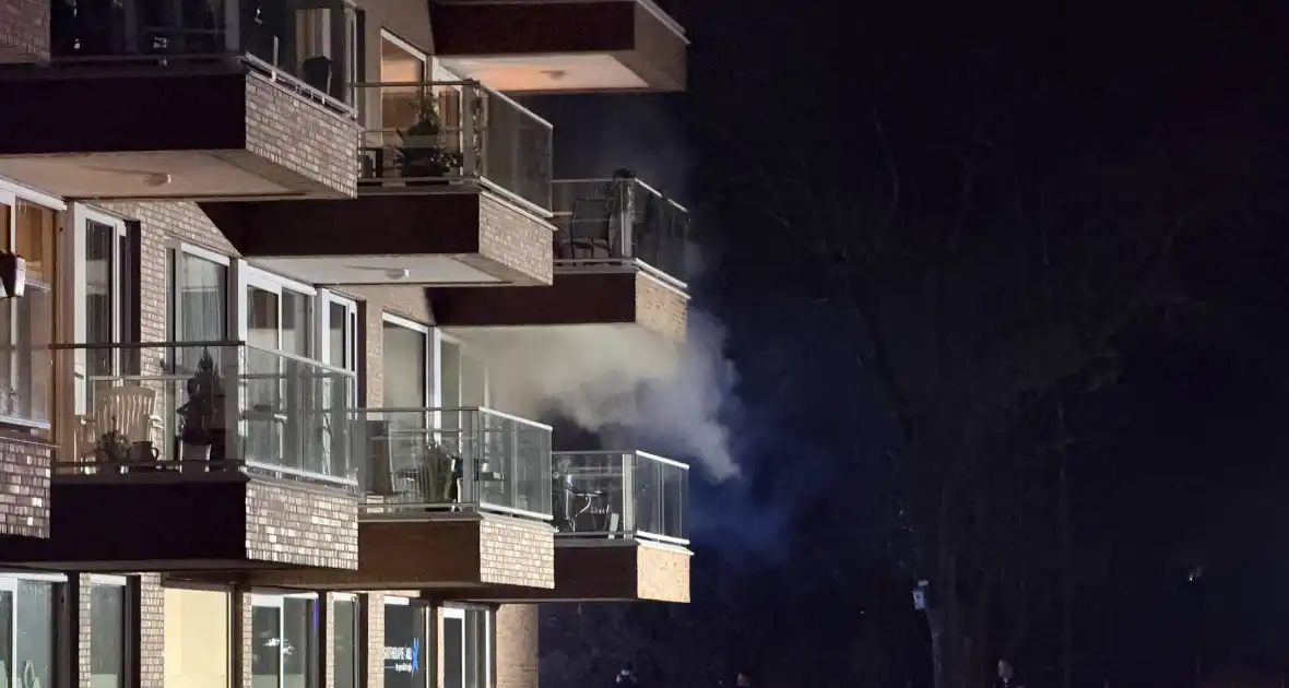 Woningbrand leidt tot evacuatie en gewonden - Foto 3