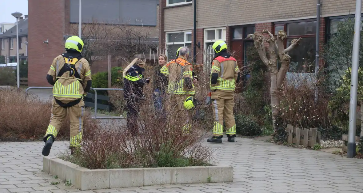 Bakpapier in oven leidt tot woningbrand - Foto 1