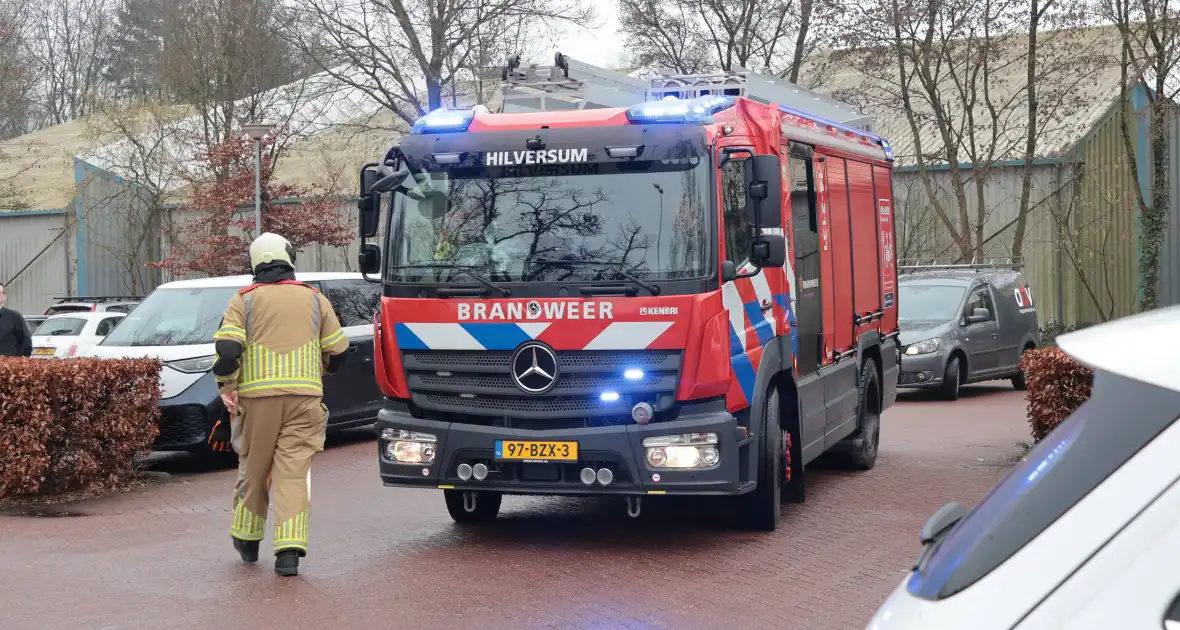 Brand in afvalcontainer bij hockeyvereniging - Foto 1