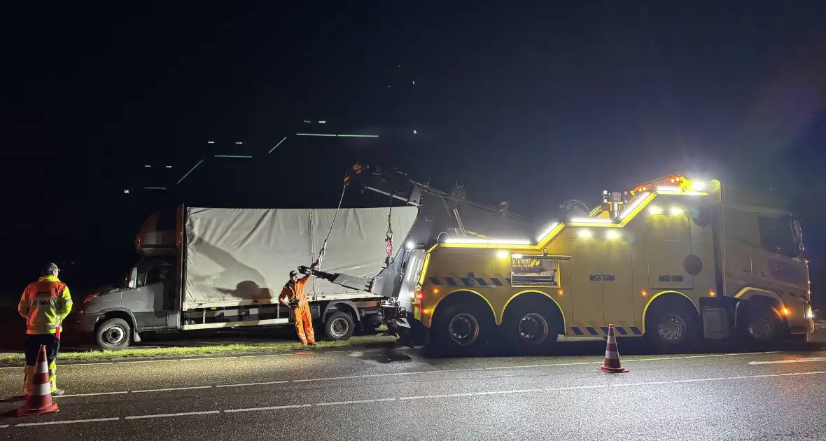 Lading omver in bakwagen - Foto 2