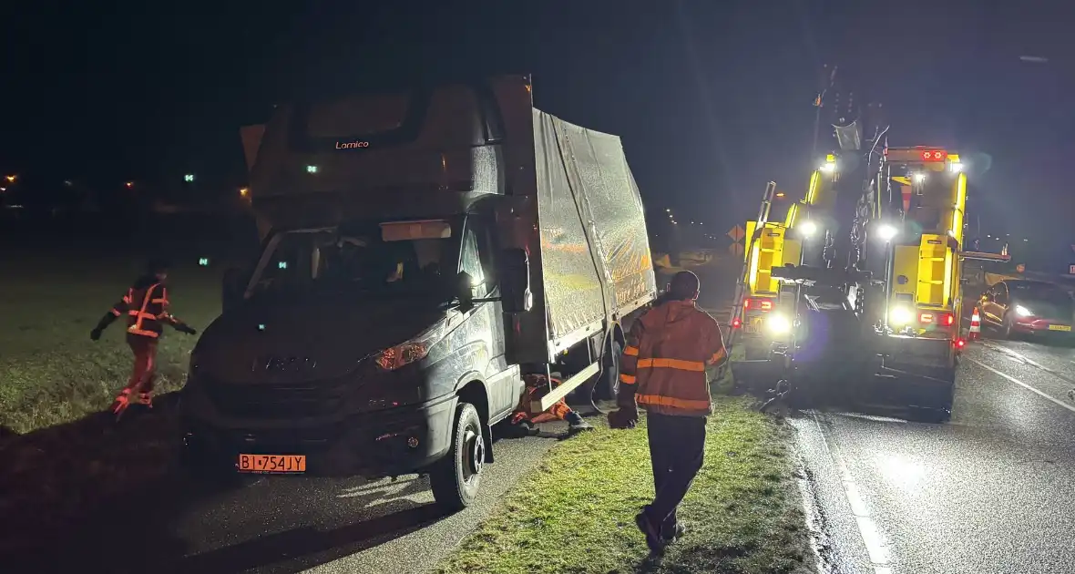 Lading omver in bakwagen - Foto 3