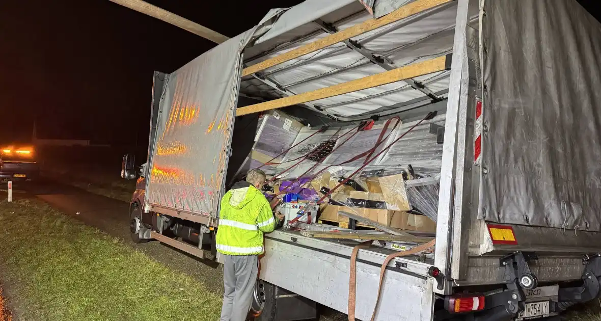 Lading omver in bakwagen - Foto 4