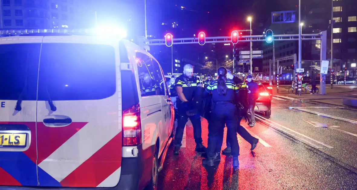 Politieachtervolging eindigt op Erasmusbrug - Foto 11