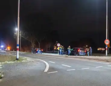 Aanrijding tussen twee auto's met aanhouding