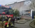 Brand in woonkamer leidt tot middelbrand