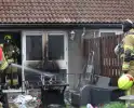 Brand in tuin leidt tot woningbeschadiging