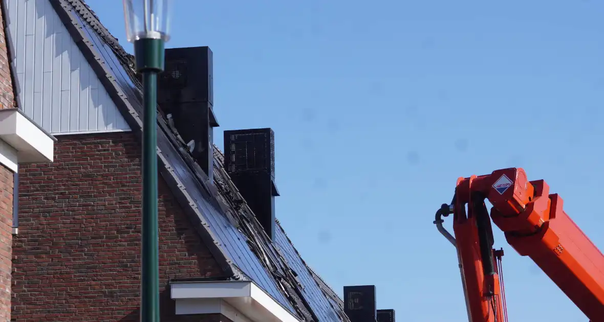 Middelbrand in woningen met zonnepanelen - Foto 4