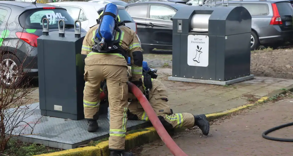 Brand in ondergrondse afvalcontainer geblust - Foto 4
