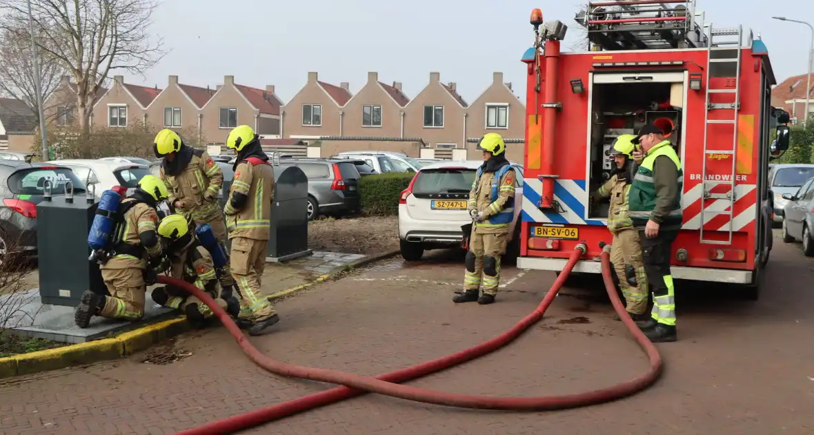 Brand in ondergrondse afvalcontainer geblust - Foto 5