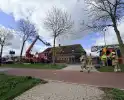 Brand in schoorsteen slaat over naar rieten dak