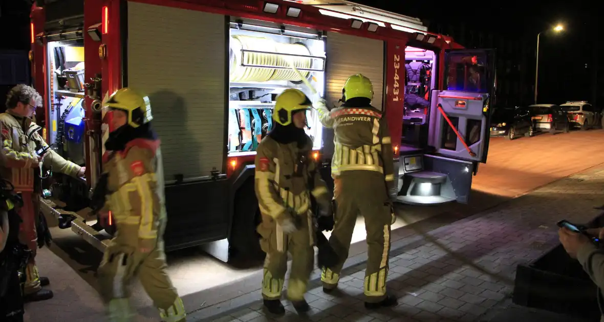 Buitenbrand in container geblust door buurtbewoners - Foto 6