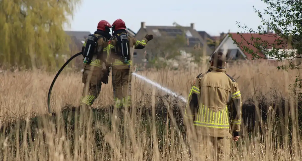 Brand in rietgebied snel geblust - Foto 8
