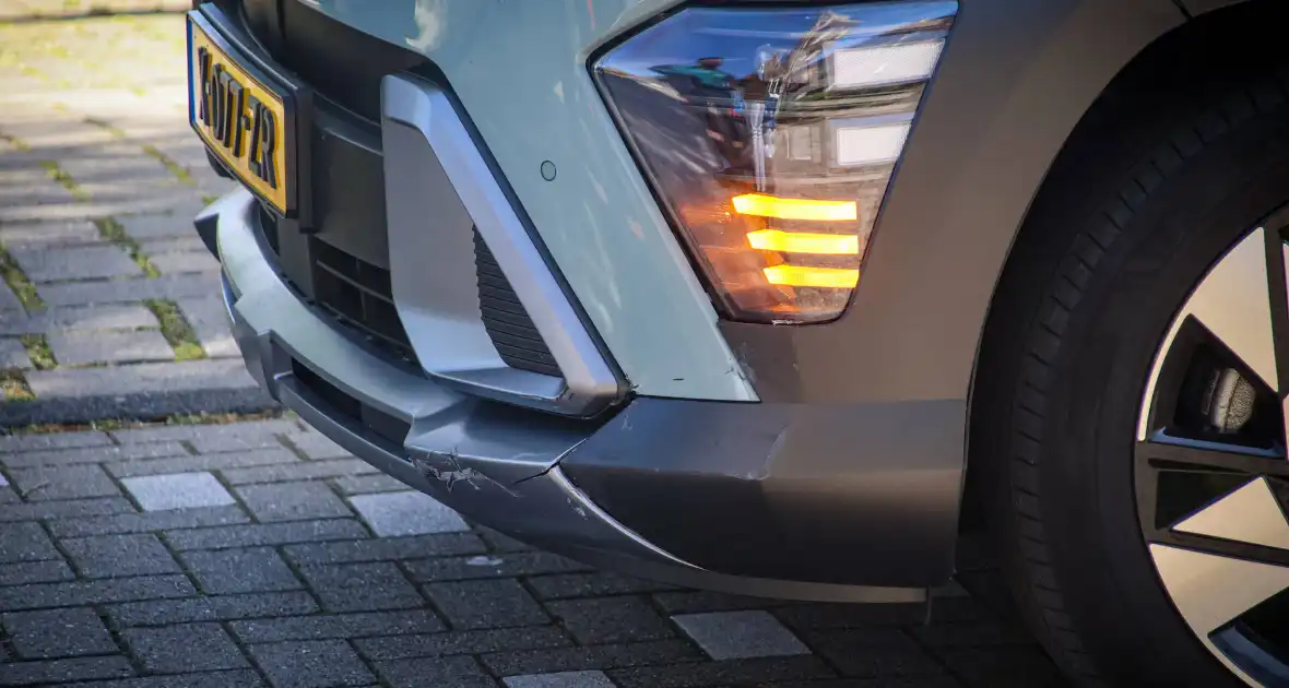 Ongeval tussen auto en motorscooter - Foto 10
