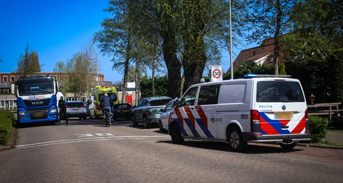 Ongeval tussen auto en motorscooter - Foto 12