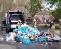 Lading in vuilniswagen vat vlam