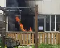 Buitenbrand overslaat naar woning