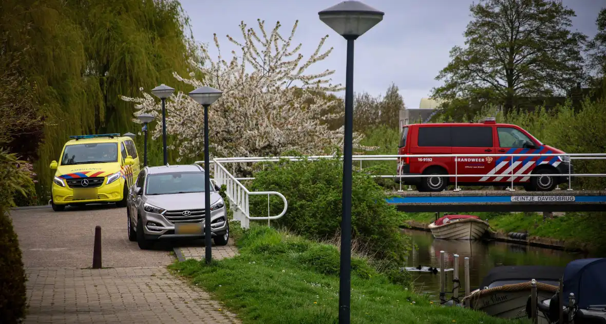 Te water geraakte scootmobiel door omstanders ontdekt - Foto 1