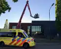 Brand op dak van bedrijf