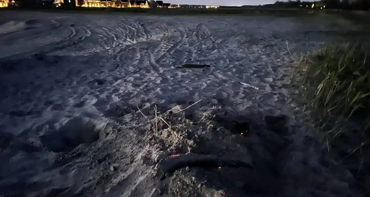 Buitenbrand geblust aan strand