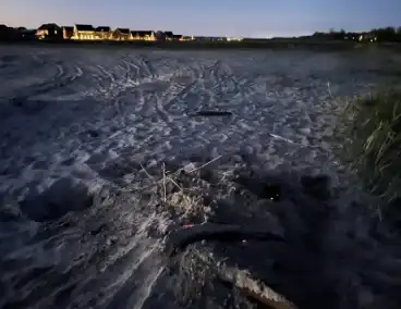 Buitenbrand geblust aan strand